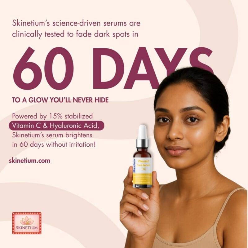 A woman in her 30s applying vitamin C serum for glowing, youthful skin — Skinetium Vitamin C Face Serum bottle beside her.